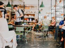 People at a crowded coffee shop.